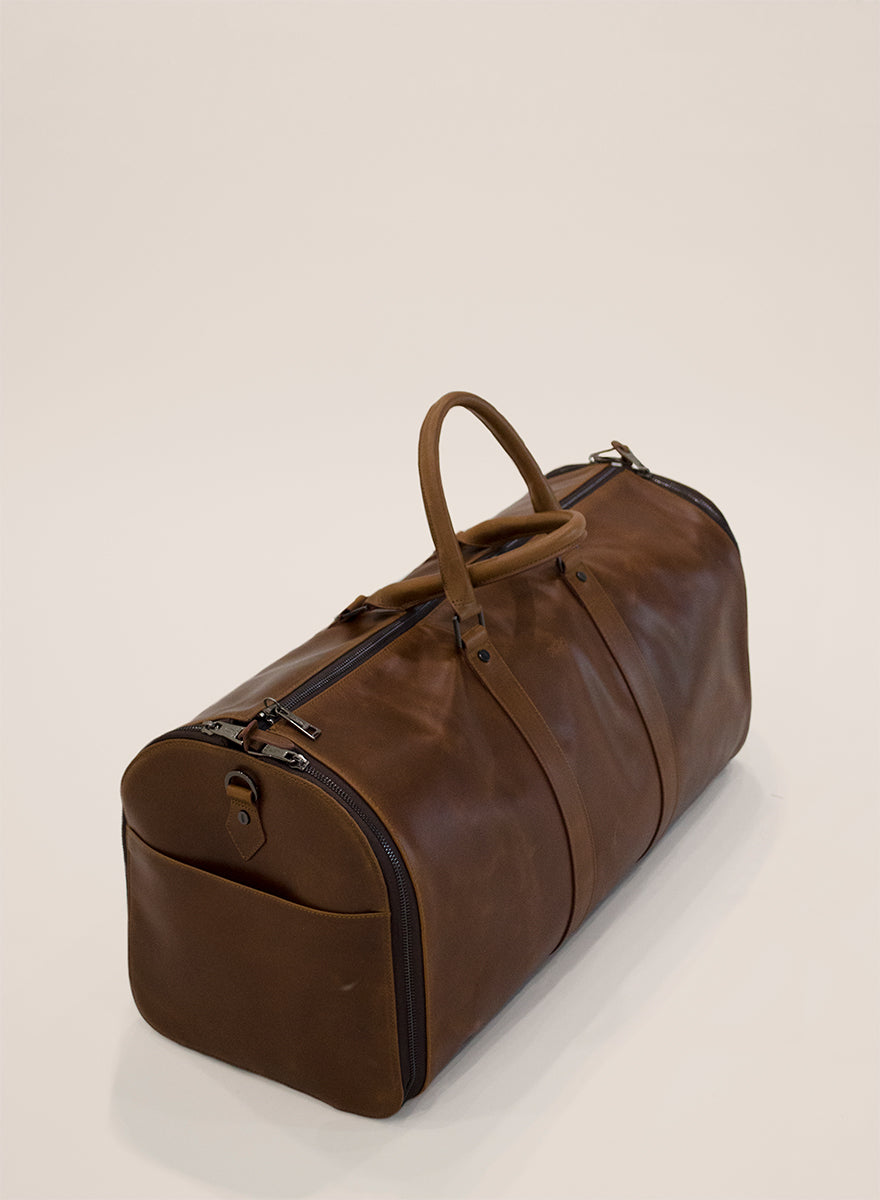 Bolsa tote de piel con portatraje Junco