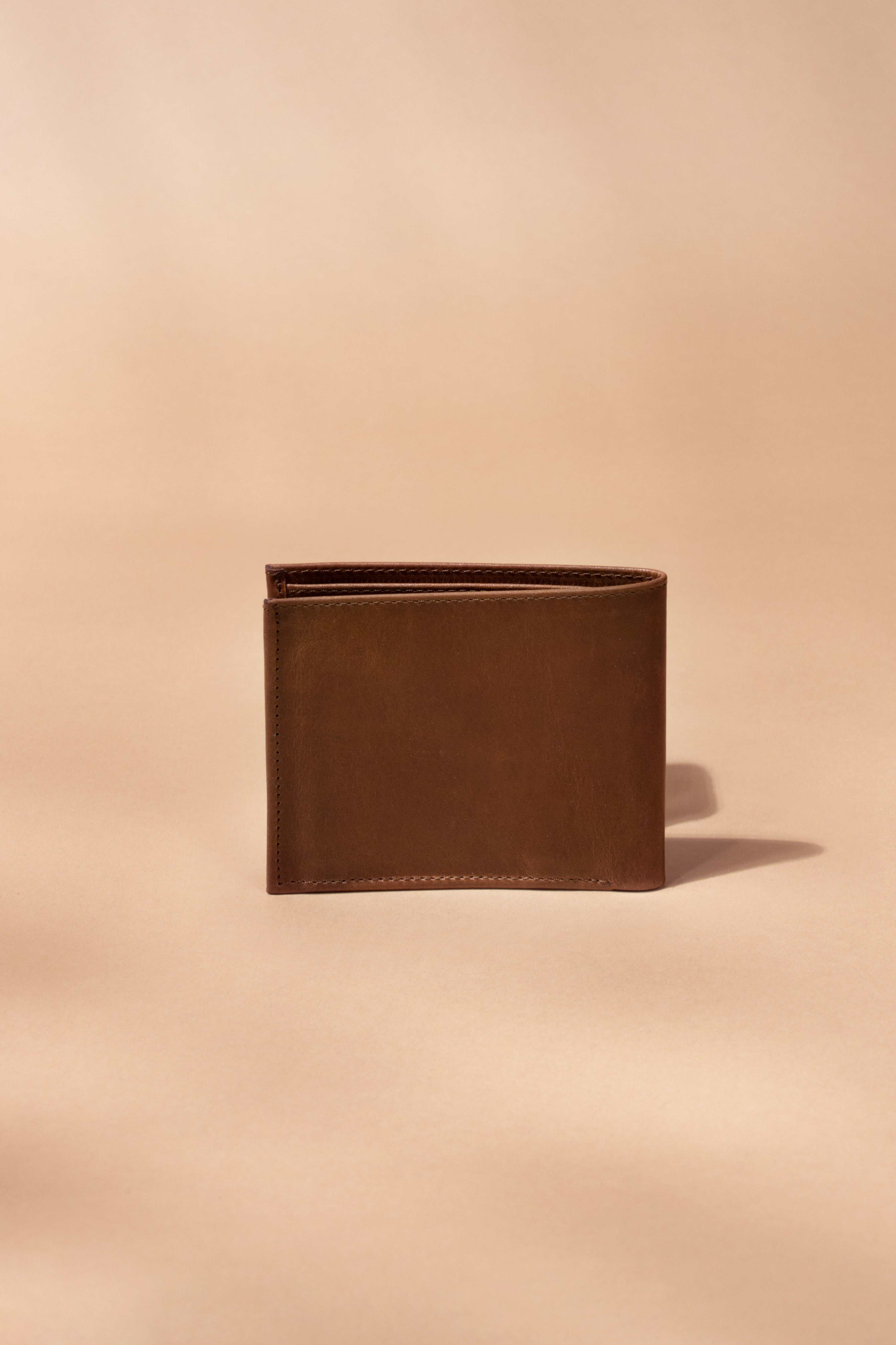 Cartera de piel Tordo