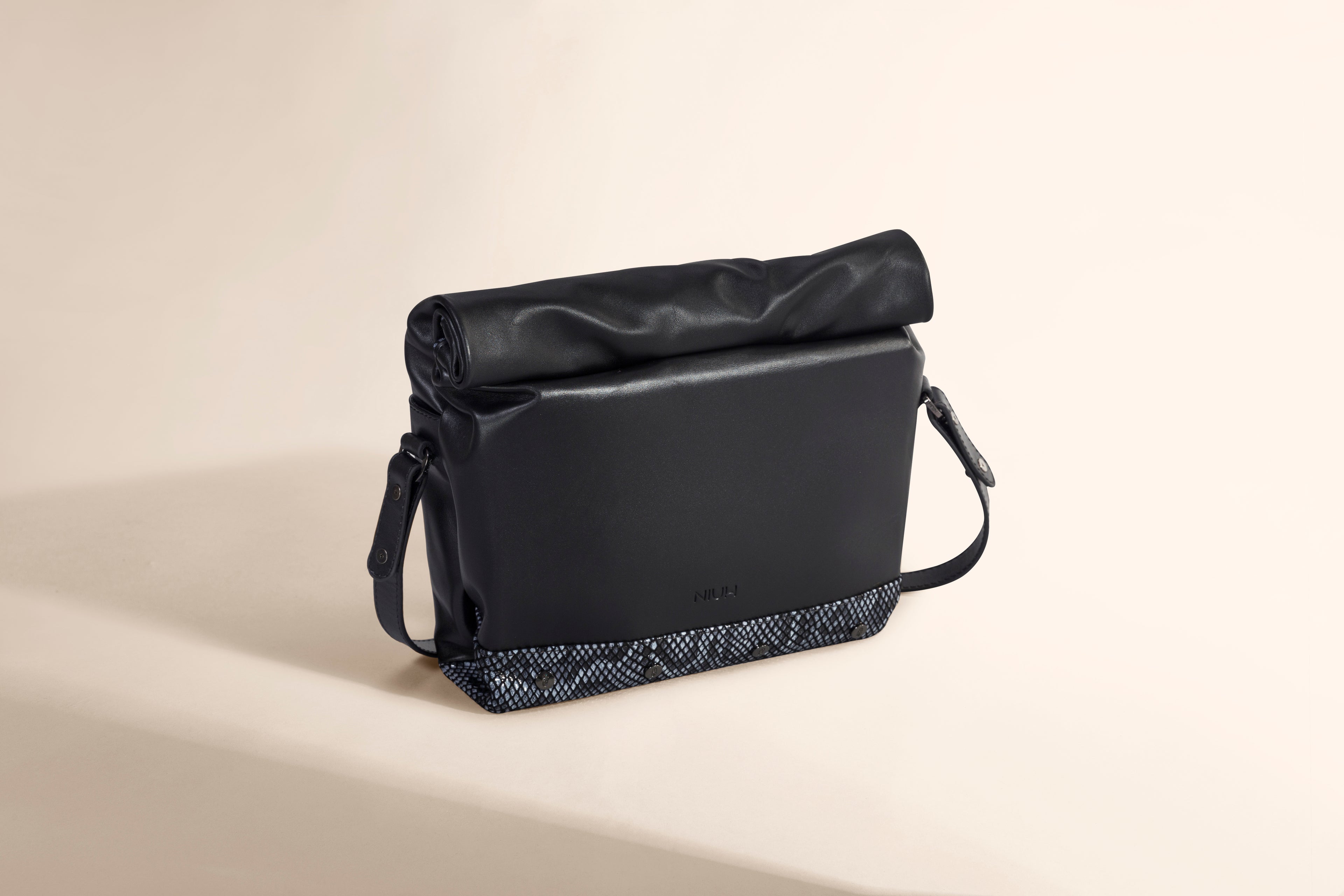Bolsa crossbody de piel con textura Toquí