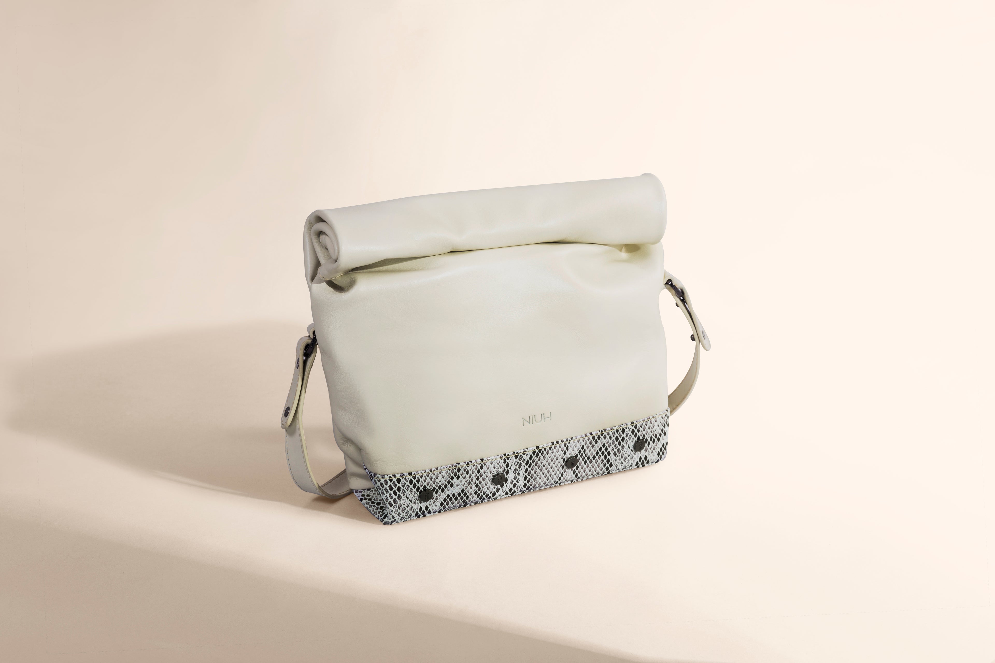 Bolsa crossbody de piel con textura Toquí