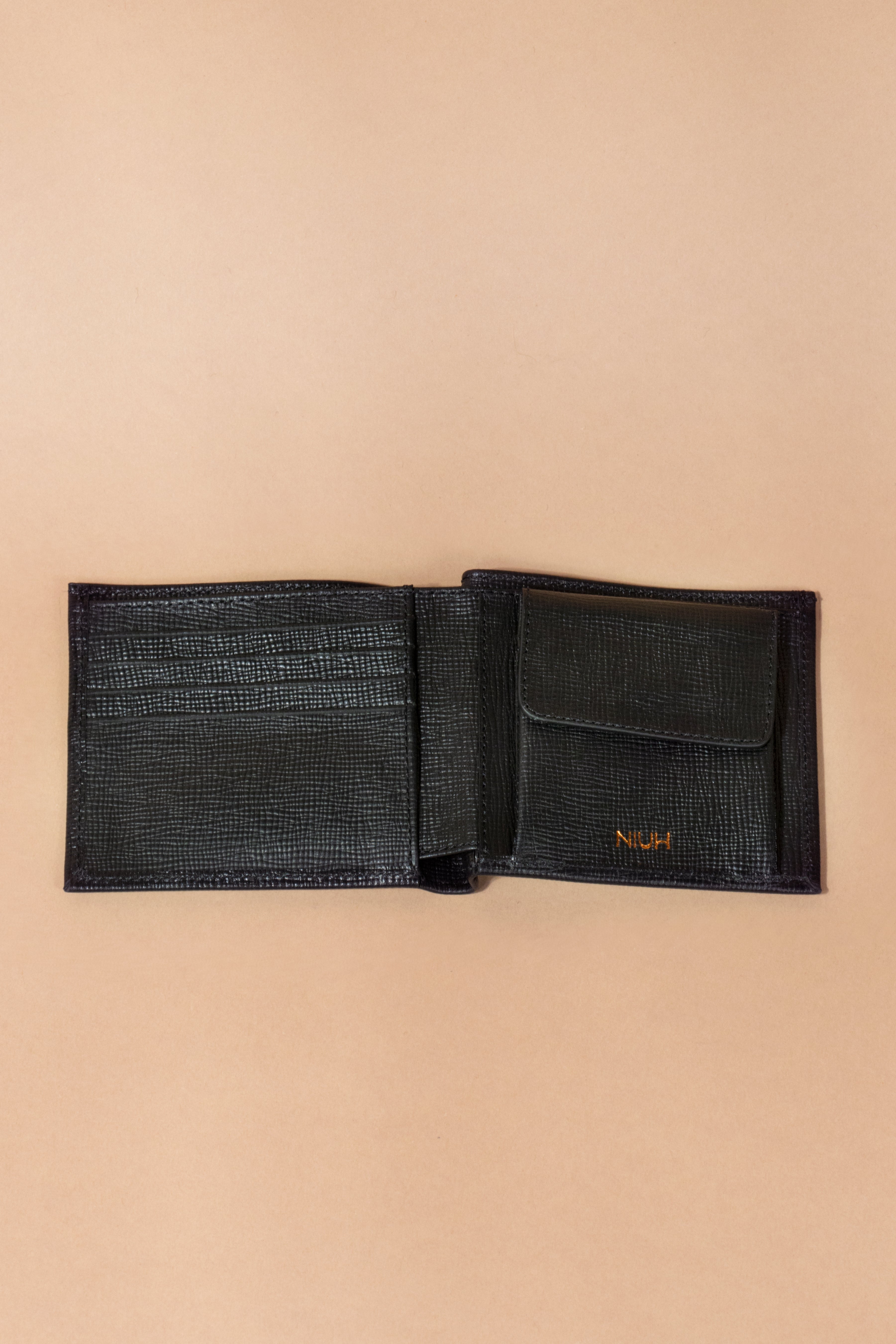Cartera de piel Tordo